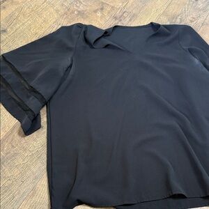 Elegant Black Blouse with Sheer Sleeves